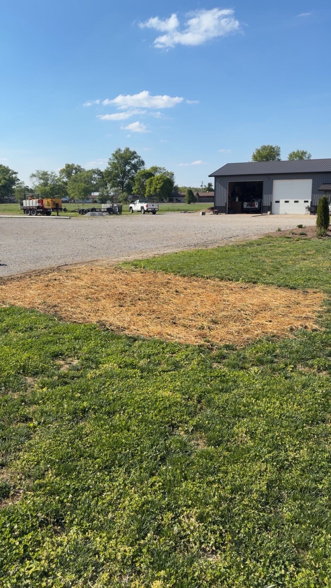 Shop property with newly seeded patch